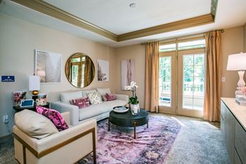 Stone creek at brookhaven apartment living room with french doors